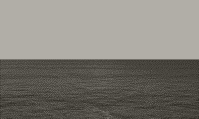 a illuminated microscope on a table with a chair in a dark exhibition space